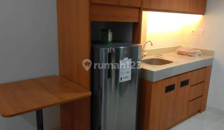 DIJUAL CEPAT Apartemen Vasanta Innopark 1BR Furnished View Pool 1