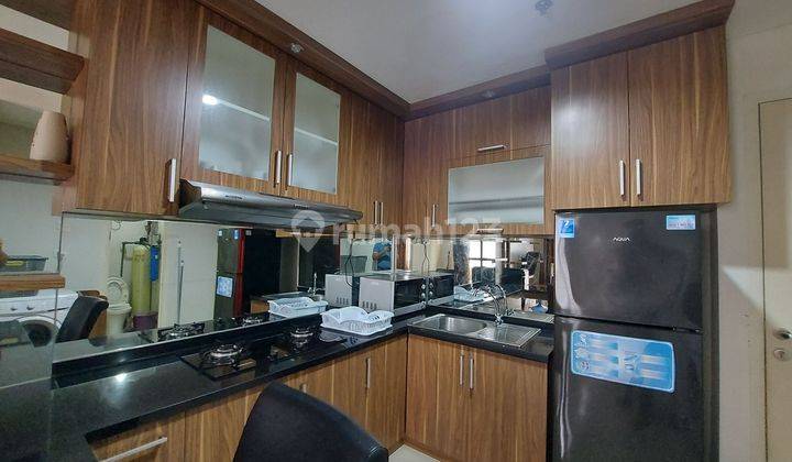 Disewakan Apartemen Trivium The Suites 1br Full Furnished View Danau 2