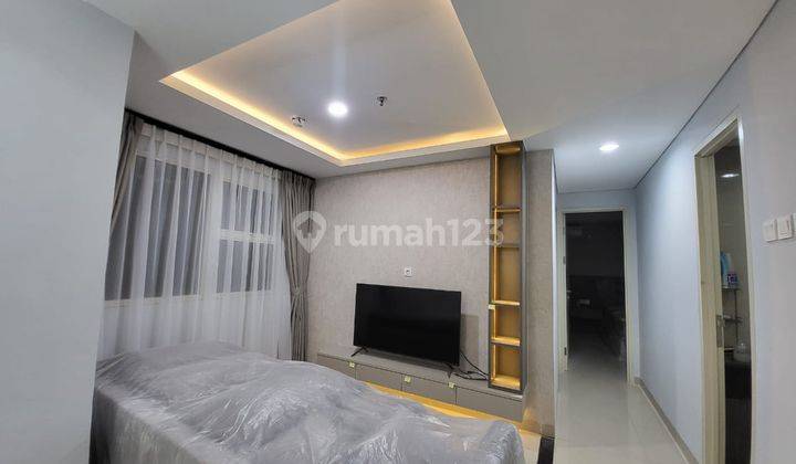 Disewakan Studio Apartemen Orange County di Lippo Cikarang 1