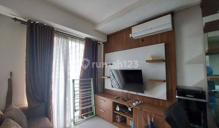 Disewakan Apartemen Trivium The Suites 1br Full Furnished View Danau 1