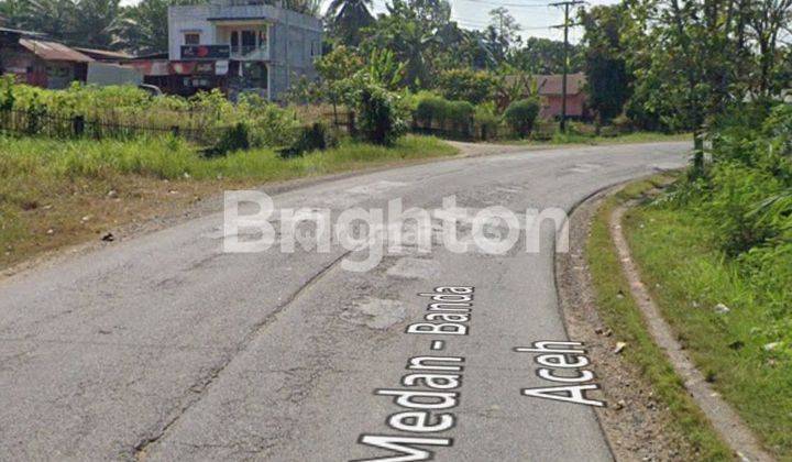 Tanah dipinggir jalan lintas cocok buat gudang, komplek,rumah sakit 2