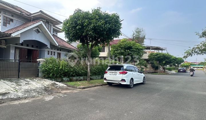 Large lush corner house for rent in Kemang Pratama, Bekasi.