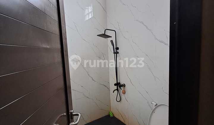 For Sale Ready-to-Use House in Duta Cimanggis Residence, Depok (Ir)