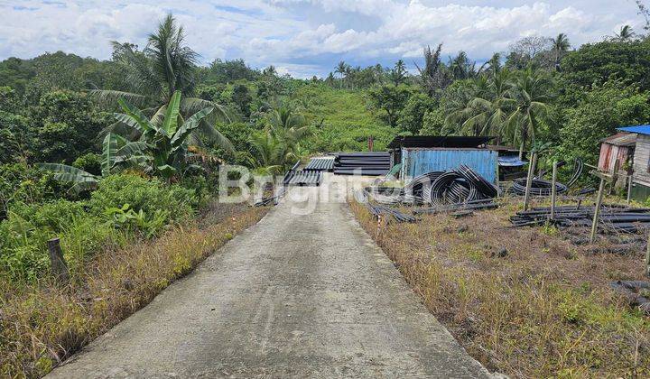 tanah di km 12 pinggir jalan besar cocok untuk investasi 2