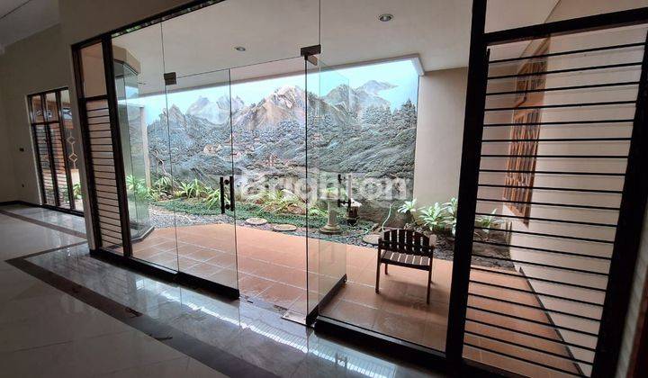 Rumah  di Dieng  parkir 8 mobil cocok untuk usaha atau perkantoran kota Malang 1