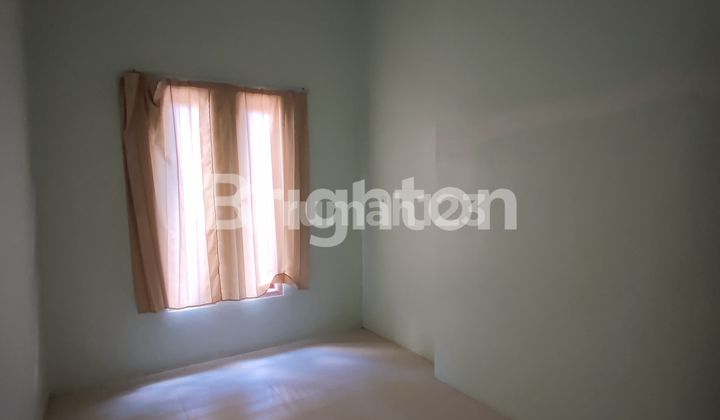 Two-story house with a 2-car carport for sale, vacant, located in Lawang, Malang. 2