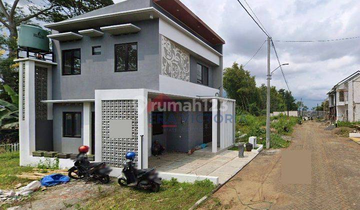 Rumah minimalis kondisi baru dalam perumahan Grand Arumba, Lowokwaru 2