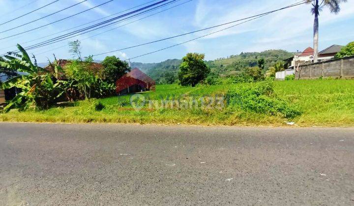 Tanah dekat pasar lawang lokasi poros jalan 2