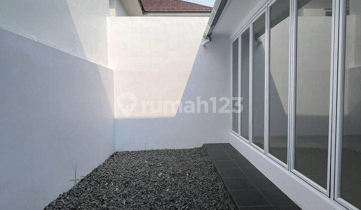 Rumah Selesai Renovasi Siap Huni Dalam Cluster di Kota Wisata 2