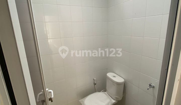 Shop House on the Side of the Road with Easy Access and Bustling Area Behind Tourist City 2