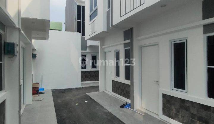 Dijual rmh keren,modern,minimalis lokasi strategis tamansari jakbar 1