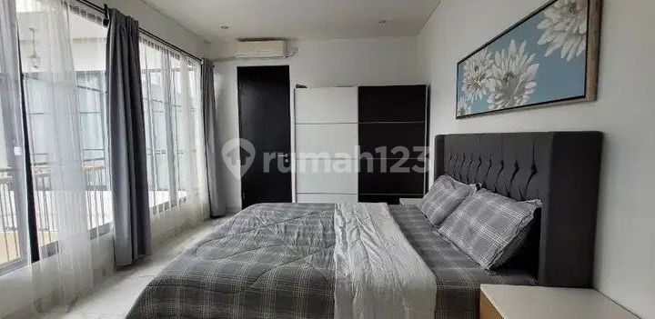 A 2-Story House with a Swimming Pool at Dago Resort Bandung 2