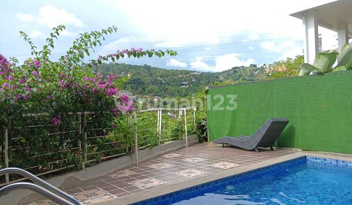 Two-Story House with Swimming Pool in Dago Pakar Resort, Bandung 2