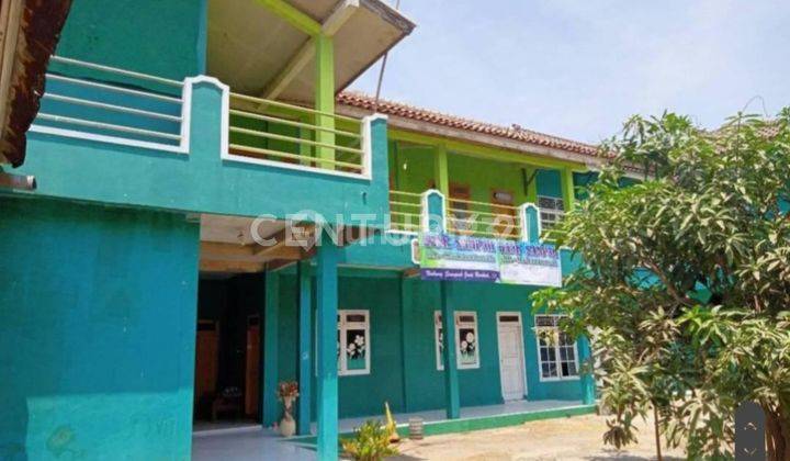 Gedung Berparkiran Luas Dan  Kios Di Jalan Kabupaten Subang 1