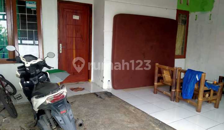 garasi/carport rumah over kredit di griya