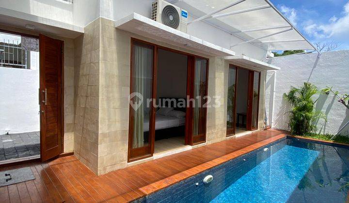 Minimalist tropical villa for sale in Kutuh near Pandawa Beach 1