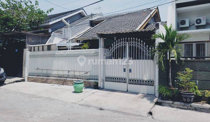 Dijual Rumah Lama Terawat Minimalis Babatan Pantai Utara 1