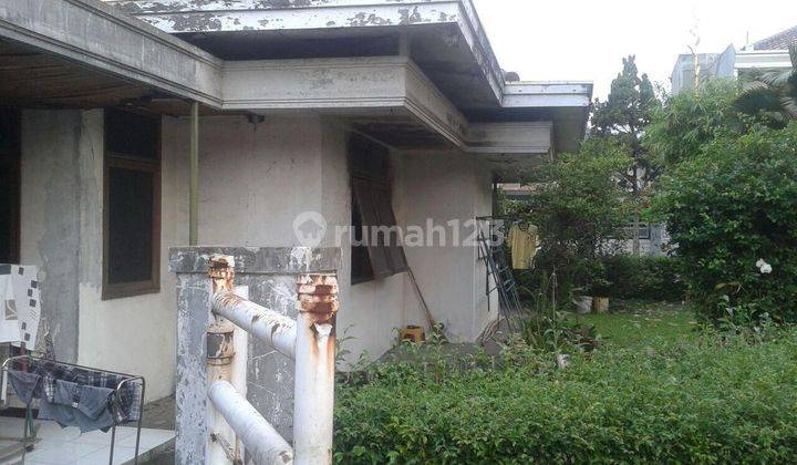 Tanah hook ada rumah tua jual bu di di Taman sakura indah 2