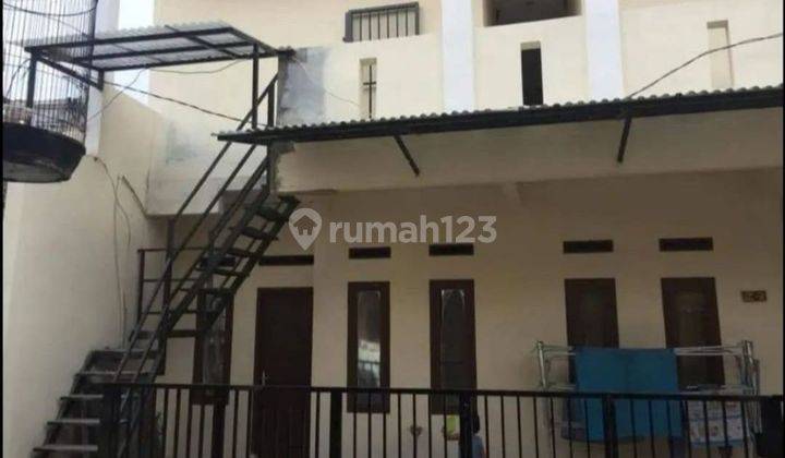 Rumah kost 12 kamar full isi siap lanjutkan di kurdi  1