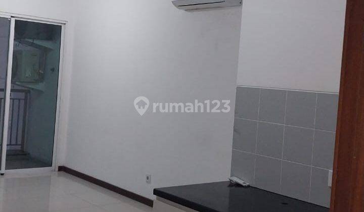 Disewakan Tahunan Condo Greenbay Pluit 1BR Unfurnish 2AC Tower M Lantai Rendah View Kota 1