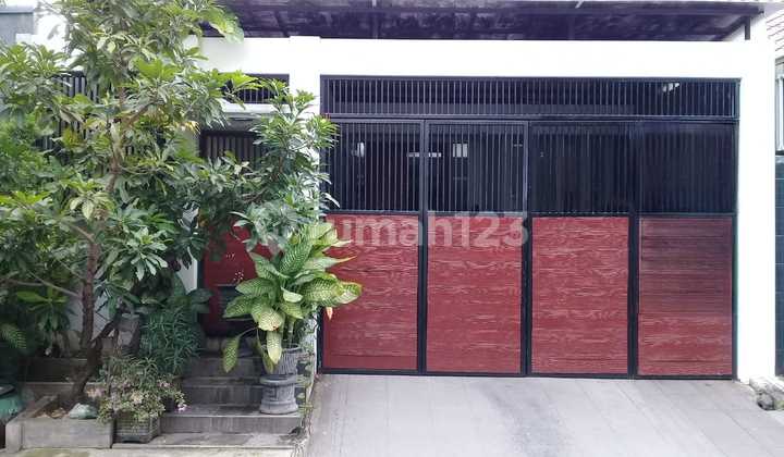 Bangunan Modern Full Kaca Rumah Griya Citra Asri  1