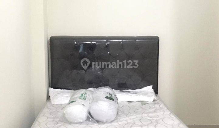 kamar tidur unit 2 br apartemen grand