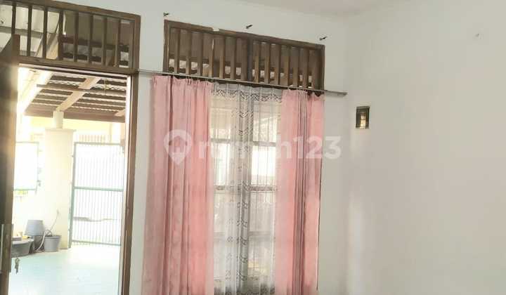 Rumah Luas Dalam Cluster Dekat Fasilitas Umum di Graha Raya 2