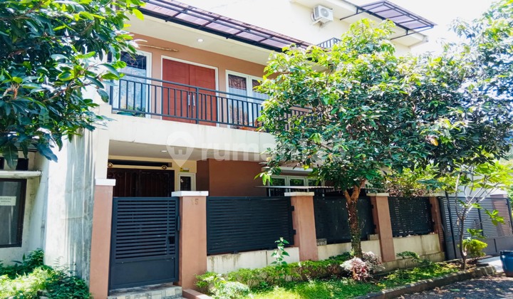 tampak depan rumah hoek bagus di cluster