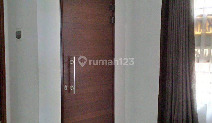 Rumah 2 Lantai semi furnished hadap Timur di Perum Taman Anggrek 2