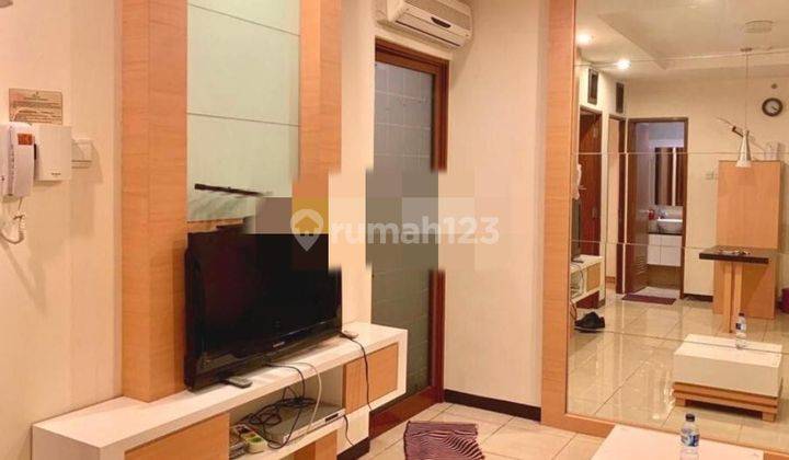 ruang tamu apartment siap huni di grand