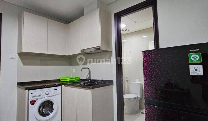 Dijual Turun Harga Apartemen Puri Mansion 1 BR Furnished Baru Luas 37m2  2