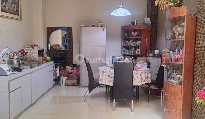 Disewakan Rumah Bagus 2,5 Lantai Semi Furnished di Taman Grisenda Kapuk Jakarta Utara 1