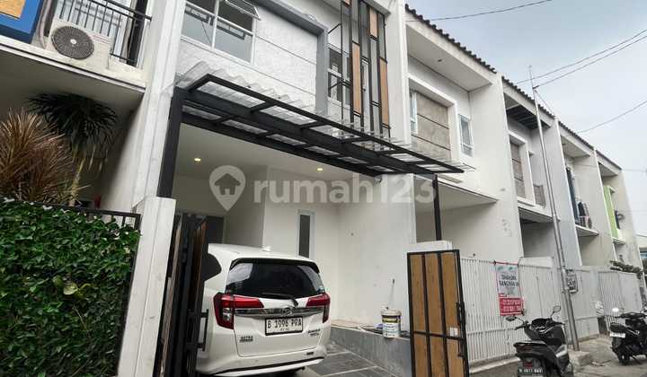 For sale semi-furnished minimalist house in Rawa Buaya, Cengkareng, West Jakarta. 1