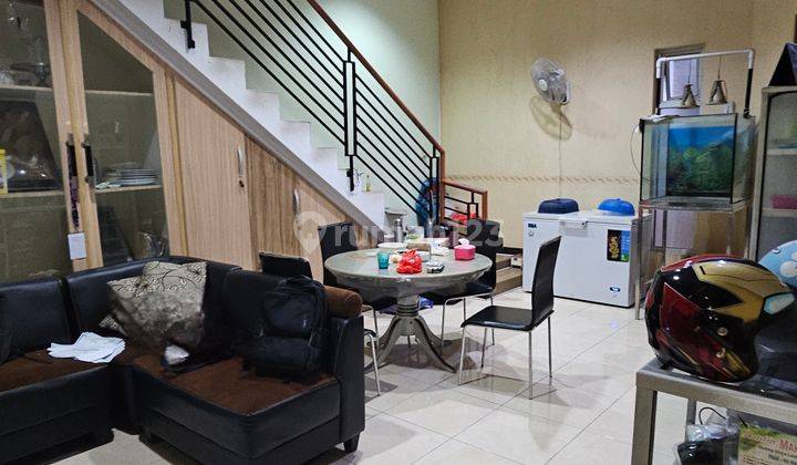 Rumah Minimalis Tinggi Dari Jalan Hitung Tanah 2