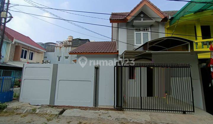 Rumah Bagus Dan Siap Huni di Taman Palem Lestari, 0042 Chr 1