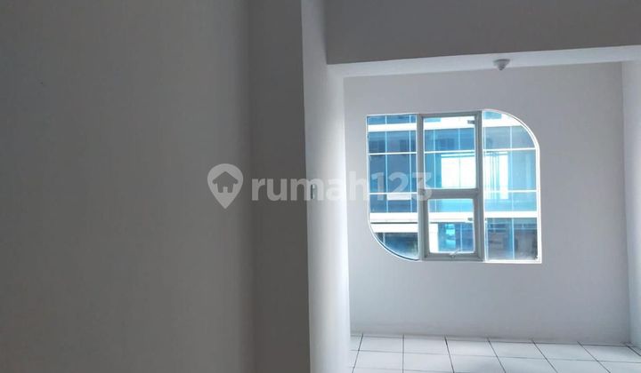 Must be cheap, sold at a loss, City Square apartment, studio type. 2