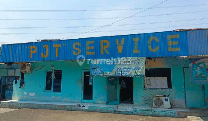Tanah dan Bangunan bengkel steam mobil