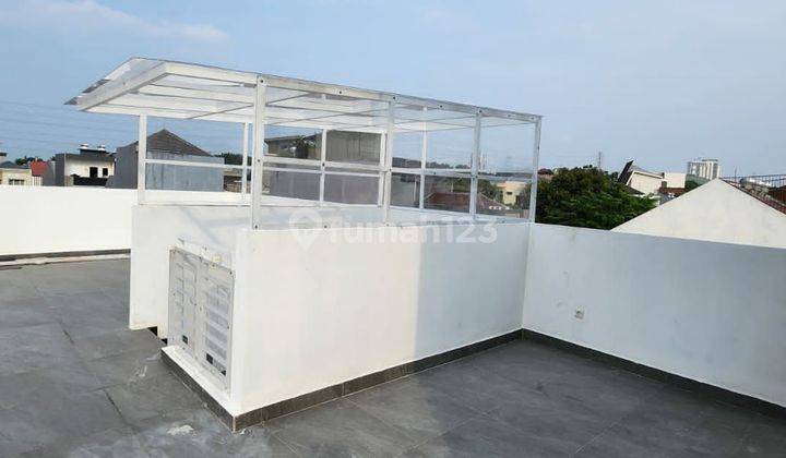 RUMAH BRAND NEW 3 LANTAI DENGAN ROOFTOP JANUR ASRI DIJUAL 2