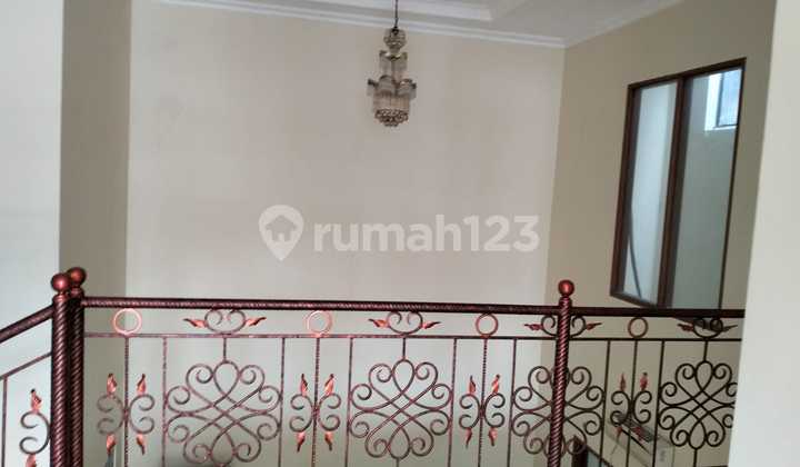 Affordable 2-Story Minimalist Semi-Furnished Ready-to-Live House Near Gwalk In Villa Sentra Raya Citraland Utama West Surabaya 2