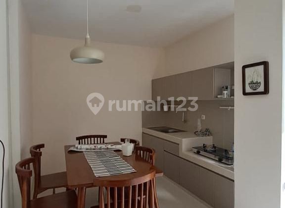 Affordable 2-Story Fully Furnished Ready-to-Occupy House Near Modern Market In Greenwood Citraland Utama West Surabaya 2