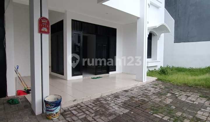 Affordable 2-Story Minimalist House Semi-Furnished Ready to Occupied Near Gwalk in International Village Citraland Utama West Surabaya 2