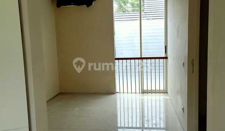 Affordable 2-Story Minimalist Semi-Furnished Ready-to-Occupy House Near Gwalk at Somerset Citraland Main, West Surabaya 2