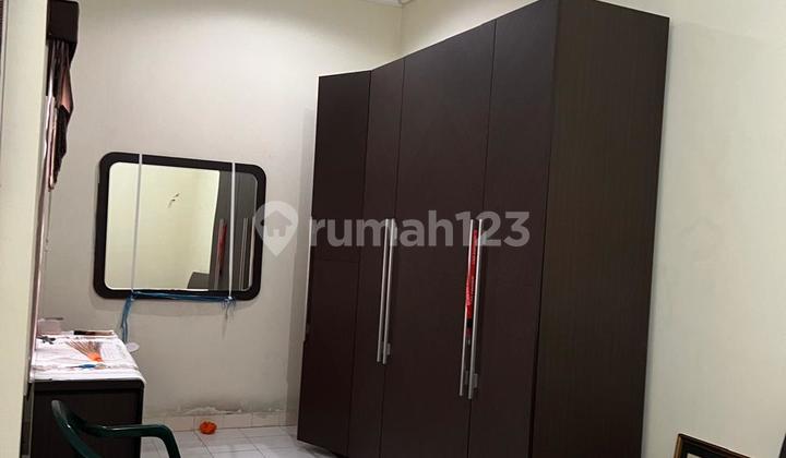 Affordable 1-Story Minimalist Semi-Furnished Ready-to-Live House Near Modern Market In Taman Puspa Raya Citraland Utama West Surabaya 2