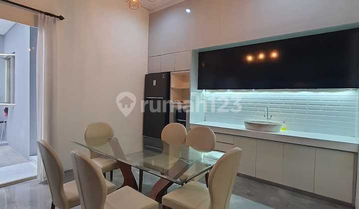 Affordable 2-Story Minimalist Semi-Furnished Ready-to-Occupy House Near Gwalk in International Village, Citraland Utama, West Surabaya 2