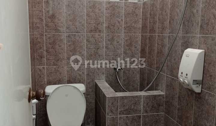 Affordable 1-Story Minimalist Unfurnished Ready-to-Live House Near Modern Market at Taman Puspa Raya Citraland Utama West Surabaya 2