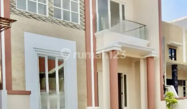 Affordable 2-Story Minimalist Semi-Furnished House Ready to Occupy Near Gwalk in International Village Citraland Utama West Surabaya 2