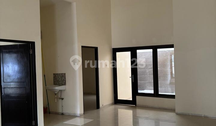 Affordable 1-Story Minimalist Semi-Furnished Ready-to-Occupy House Near Modern Market In Taman Puspa Raya Citraland Utama West Surabaya