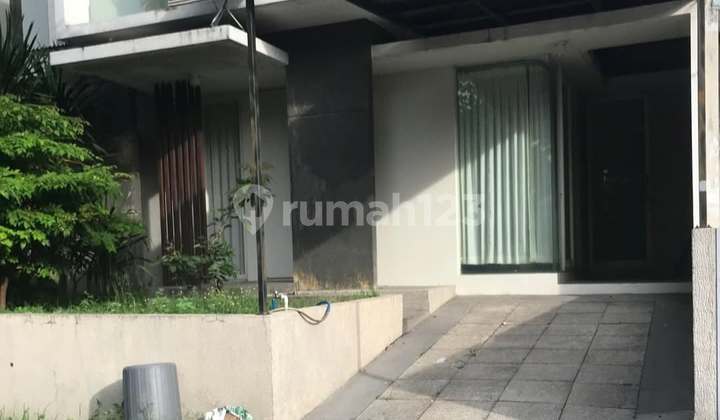 Affordable 2-Story Minimalist Semi-Furnished Ready-to-Occupy House Near Modern Market in Greenwood Citraland Utama, West Surabaya 2