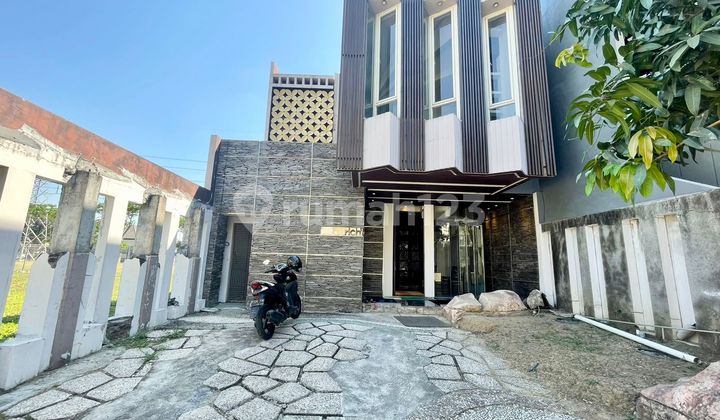 Affordable 2-Story Minimalist House Semi-Furnished Ready to Occupy Near Modern Market in Woodland Citraland Utama West Surabaya