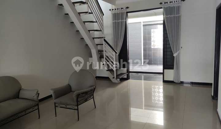 Affordable 2-Story Minimalist Semi-Furnished House Ready to Occupy Near Gwalk in Villa Sentra Raya Citraland Utama West Surabaya 2